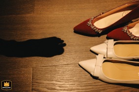 In Kaifeng, Henan, China, the photographer captures a creative image of the bride's wedding shoes as part of the preparations.